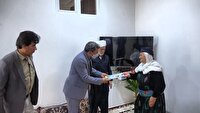 تکریم خانواده مکرم دو شهید سادات در تکاب آذربایجان غربی